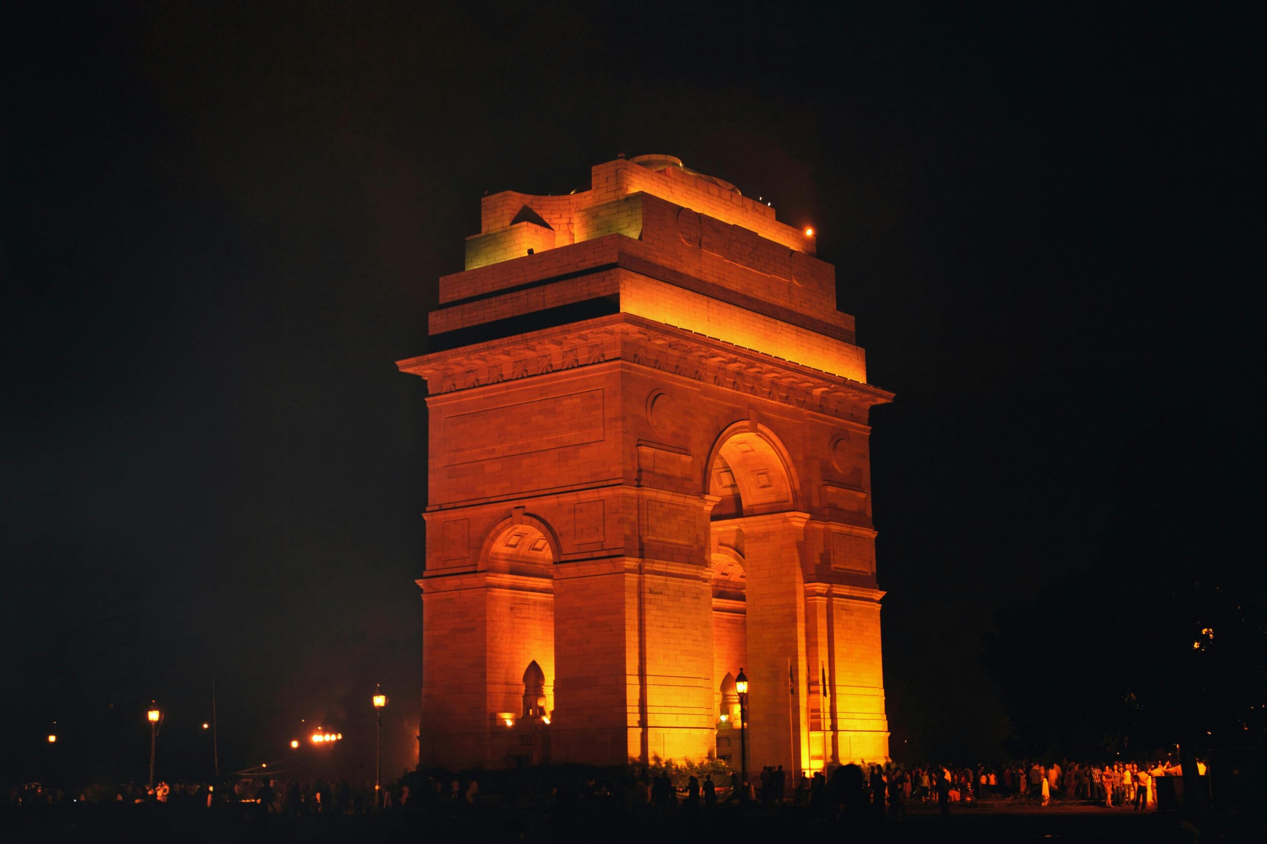 Stunning view of India Gate beautifully lit up at night in New Delhi, India.